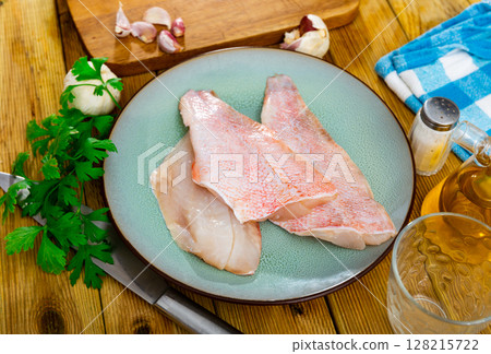 Fresh raw fillet of sea bass 128215722