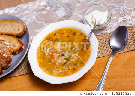 Rassolnik - Traditional Russian soup with pickled cucmbers Rassolnik - Traditional Russian soup with pickled cucmbers 128215823