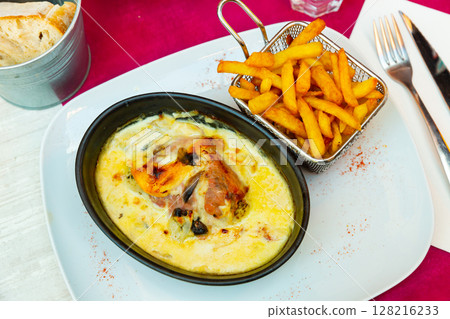 Popular dish of French cuisine is the escalope Savoyard 128216233