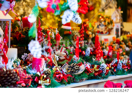 Christmas decorations with candles at outdoors market Christmas decorations with candles at outdoors market 128216247