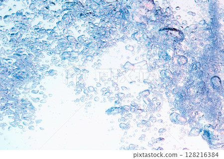 Many bubbles floating in the water. 128216384