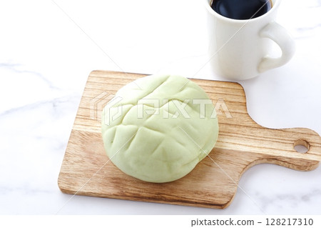 It's snack time with delicious melon bread and freshly brewed coffee. It's snack time with delicious melon bread and freshly brewed coffee. 128217310