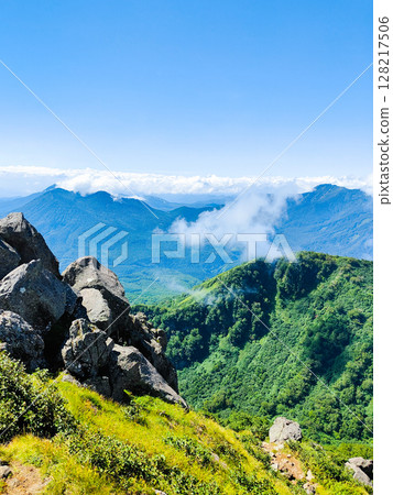 Climbing Mt. Myoko in summer (view of Mt. Kurohime and Mt. Takatsuma from the summit of the southern peak) 128217506
