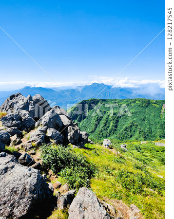 Climbing Mt. Myoko in summer (view of Mt. Kurohime and Mt. Takatsuma from the summit of the southern peak) Climbing Mt. Myoko in summer (view of Mt. Kurohime and Mt. Takatsuma from the summit of the southern peak) 128217545