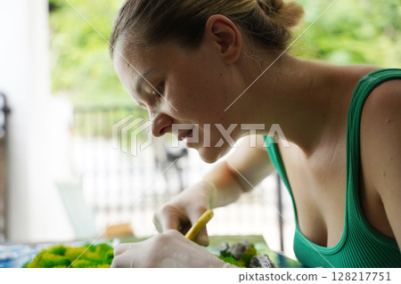 The process of making the art decor of epoxy resin, natural stones and moss 128217751