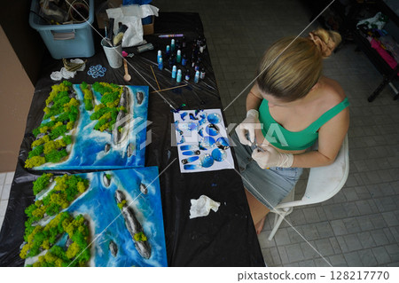 The process of making the art decor of epoxy resin, natural stones and moss The process of making the art decor of epoxy resin, natural stones and moss 128217770
