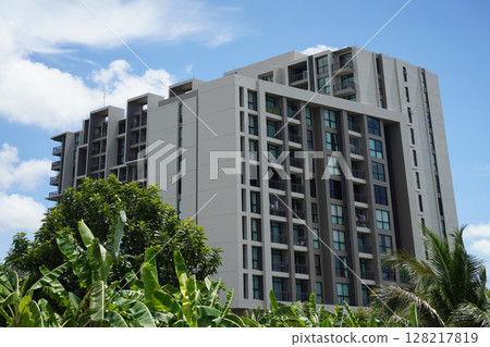 Detailed view of windows, doors and balconies of city buildings  128217819