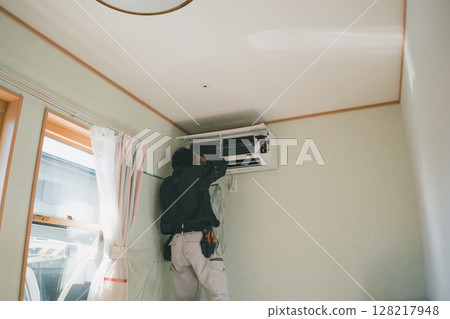 Air conditioning installation work 128217948
