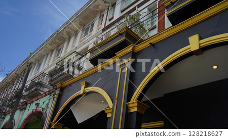 Detailed view of windows, doors and balconies of city buildings Detailed view of windows, doors and balconies of city buildings 128218627