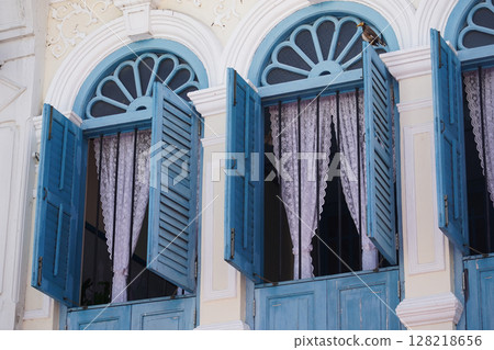 Detailed view of windows, doors and balconies of city buildings Detailed view of windows, doors and balconies of city buildings 128218656