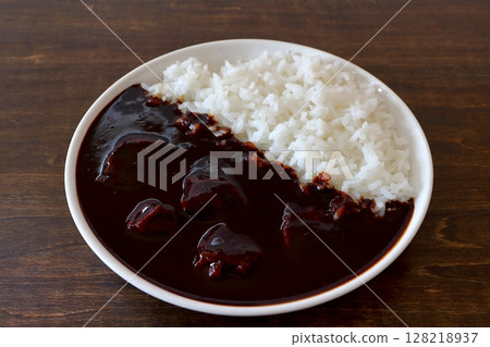 Beef curry rice and black curry on table background 128218937