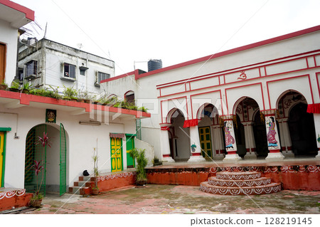 Traditional Bengali Courtyard Temple with Arched Veranda and Wall Art at Sabarna Roy Chowdhury or Mejo Bari at Behala 128219145