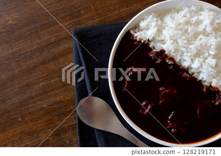 Beef curry rice and black curry on table background viewed from directly above 128219171