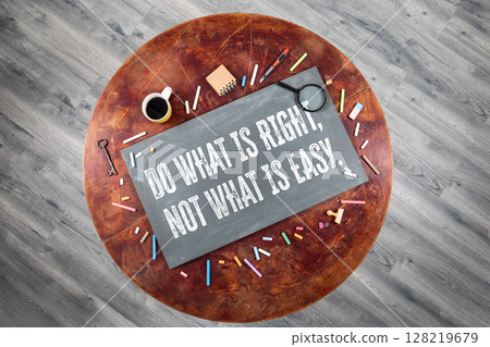 Do What Is Right Not What Is Easy Motivational Quote on Chalkboard with School Supplies Do What Is Right Not What Is Easy Motivational Quote on Chalkboard with School Supplies 128219679