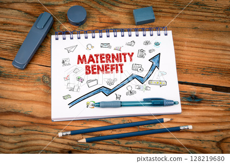 Maternity Benefit Growth Concept on Notebook with Icons and Rising Arrow on Wooden Desk Maternity Benefit Growth Concept on Notebook with Icons and Rising Arrow on Wooden Desk 128219680