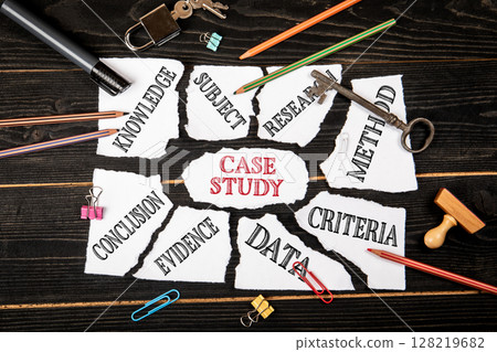 Case Study Concept with Torn Paper Pieces Showing Keywords on Dark Wooden Background Case Study Concept with Torn Paper Pieces Showing Keywords on Dark Wooden Background 128219682
