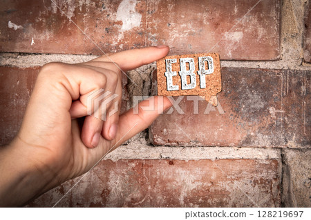 EBP Evidence based practice concept. Text in Speech Bubble Held by Hand on Brick Wall Background EBP Evidence based practice concept. Text in Speech Bubble Held by Hand on Brick Wall Background 128219697