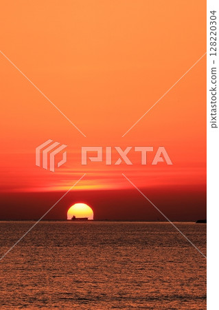 Sunset over the sea 128220304