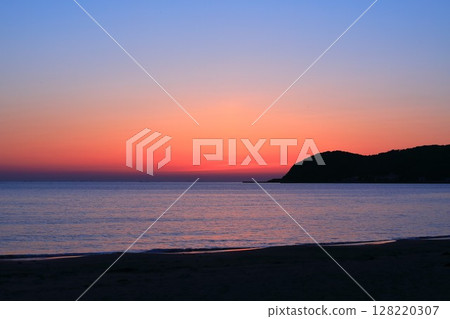 Sunset over the sea 128220307