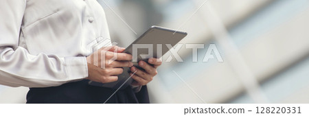 Banner Asian woman using digital tablet shopping online, call, texting message internet technology lifestyle smiling face. Banner woman touch smart tablet hands using mobile app home with copy space 128220331