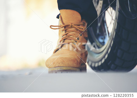 Men wear construction Boots safety footwear for worker at construction site. Engineer Wear Jeans Brown Boots Worker on Background of Refinery. Engineer safety industry fashion footwear walking outdoor Men wear construction Boots safety footwear for worker at construction site. Engineer Wear Jeans Brown Boots Worker on Background of Refinery. Engineer safety industry fashion footwear walking outdoor 128220355