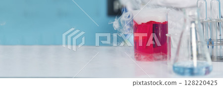 Banner Science chemistry glass tubes object on lab background. Wide Liquid tube biology laboratory chemical fluid scientist object medical glass tubes. Chemistry scientific background with Copy Space 128220425