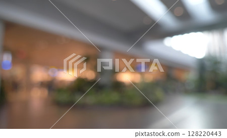 Blurred background bright shopping mall Silver gray lighting. defocused store light bokeh in retail store. Blurry hospital bright softness hotel with copy space. Backdrop present design template. Blurred background bright shopping mall Silver gray lighting. defocused store light bokeh in retail store. Blurry hospital bright softness hotel with copy space. Backdrop present design template. 128220443