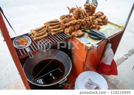 Street Fried Food with Reused Oil High-Risk Junk Food Display 128220895