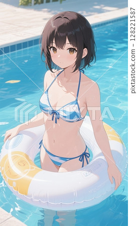 一個穿著泳衣的女孩在泳池裡的游泳圈上玩耍 一個穿著泳衣的女孩在泳池裡的游泳圈上玩耍 128221587
