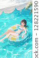 一個穿著泳衣的女孩在泳池裡的游泳圈上玩耍 128221590