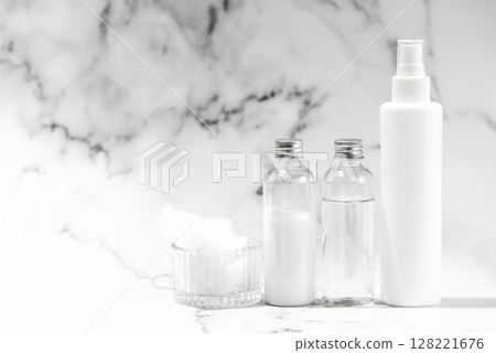 Plastic cosmetic bottles and cotton 128221676