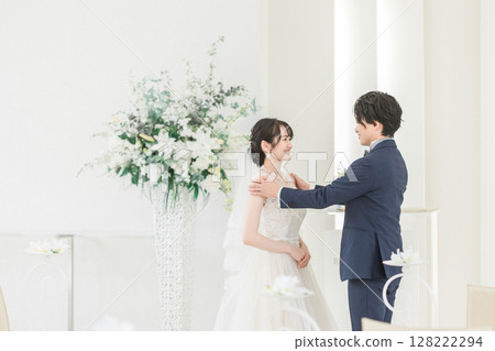 bride and groom kissing vows at wedding bride and groom kissing vows at wedding 128222294