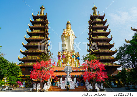 Majestic Quan Am Statue and Twin Pagodas at a Buddhist Temple in Mui Ne, Vietnam Majestic Quan Am Statue and Twin Pagodas at a Buddhist Temple in Mui Ne, Vietnam 128222313