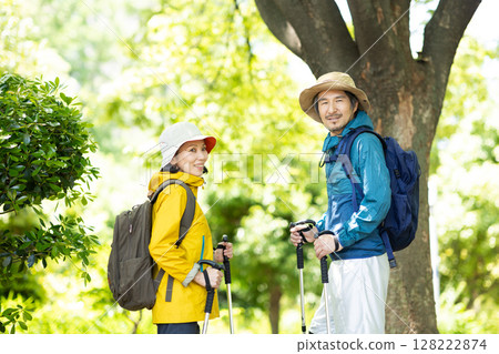 A middle-aged couple trekking 128222874