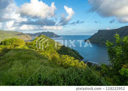 Sunset over Taipivai Bay in Nuku Hiva, French Polynesia Sunset over Taipivai Bay in Nuku Hiva, French Polynesia 128222952