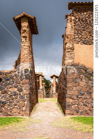 Ancient Ruins of Raqchi in the Peruvian Highlands Under Clouds 128222955