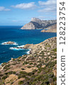Dramatic coastline meeting deep blue sea in remote island paradise, Karpathos island, Greece 128223754