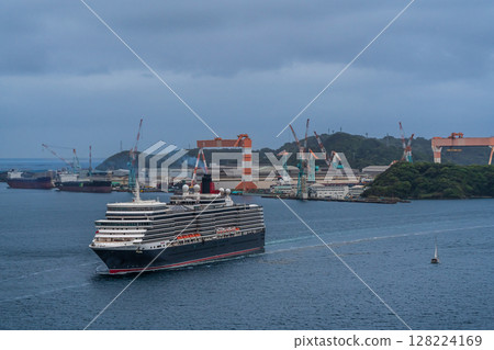 Cruise ship arriving at Nagasaki Port (Queen Elizabeth) from Megami Ohashi Bridge [Nagasaki City] 128224169