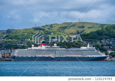 Cruise ship arriving at Nagasaki Port (Queen Elizabeth) from the opposite shore [Nagasaki City] 128224765