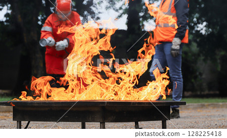 corporate safety - exercise during a firefighting course 128225418