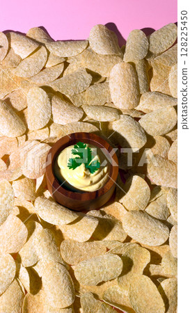 Closeup of Potato Chips and Creamy Dip Closeup of Potato Chips and Creamy Dip 128225450