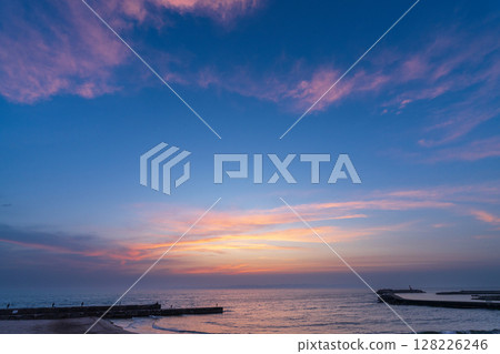 Sunset at a small harbor 128226246