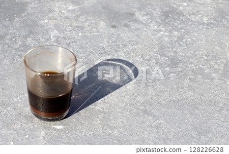 There is hot black coffee in a glass There is hot black coffee in a glass 128226628