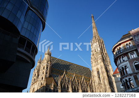 St. Stephen's Cathedral in Vienna against a blue sky. 128227168