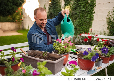 Gardening joy in a vibrant backyard oasis 128228461