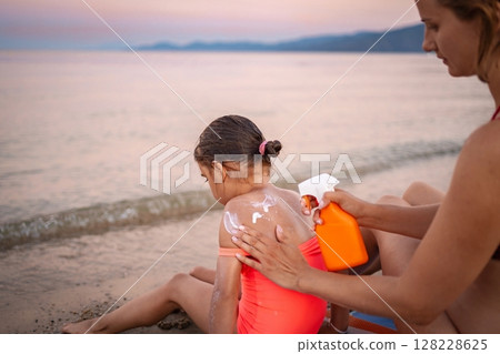 Family bonding during summer afternoons in Greece 128228625