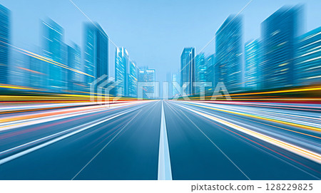 City skyline in the early morning light showcases futuristic architecture with a broad road leading into the heart of urban life and movement 128229825