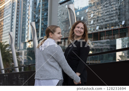Mother and daughter having fun together. Happy female family Mother and daughter having fun together. Happy female family 128231694