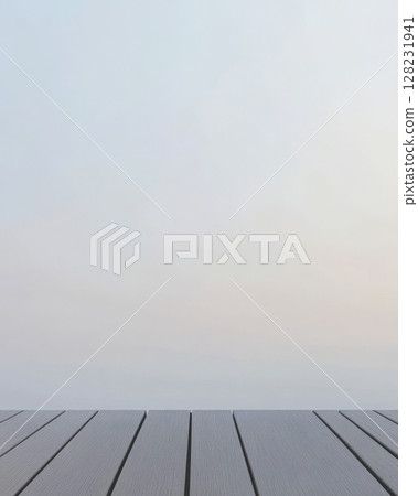 Minimalistic wooden deck overlooking serene twilight sky with soft pastel colors 128231941