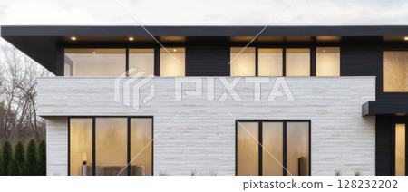 Modern minimalist house exterior with large windows and contemporary design 128232202